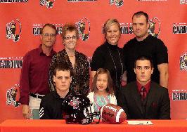 Lance and his family at signing day at Concordia University